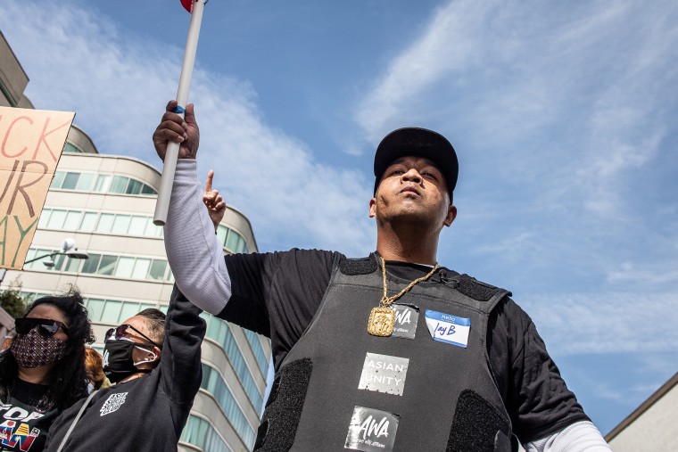 Jimmy Bounphengsy, known as Jay B, takes part in a march calling for an end to violence against Asians on April 3 in Oakland, Calif.