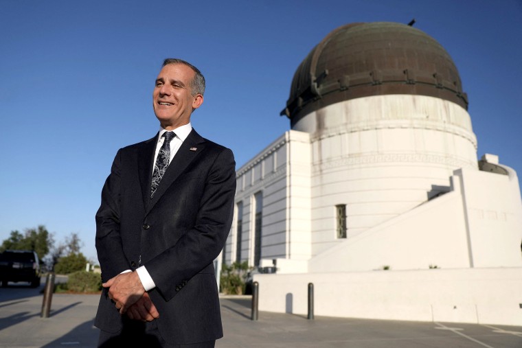 Image: Los Angeles Mayor Eric Garcetti smiles after holding his annual State of the City address from the Griffith Observatory in Los Angeles
