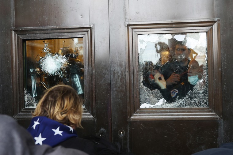 Image: A Capitol police officer at the U.S. Capitol on Jan. 6