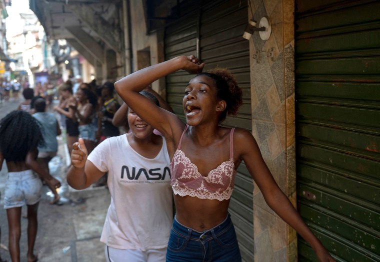 Image: Residents protest after a police operation against alleged drug traffickers at the Jacarezinho favela in Rio de Janeiro, Brazil