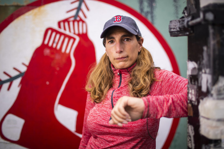 Image: Fenway Park vendor Heidi Hashem poses for a portrait on Jersey Street outside of Fenway Park on April 28, 2021 in Boston.