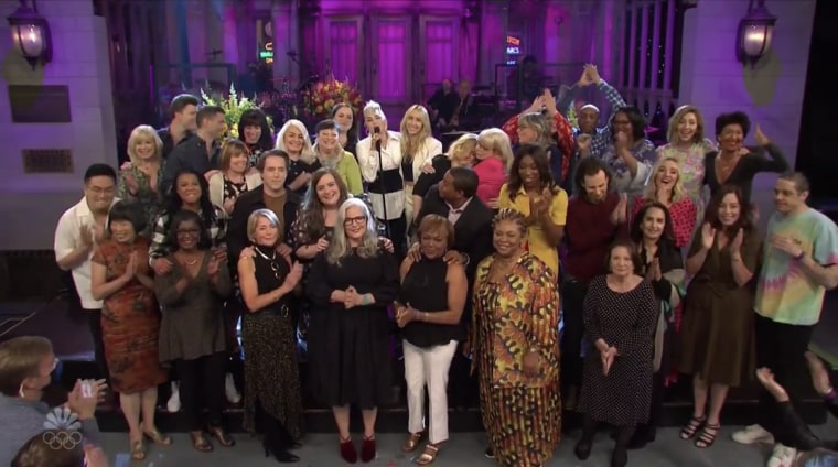Image: Saturday Night Live cast members and their moms gather on-stage during the opening of the May 8 show.