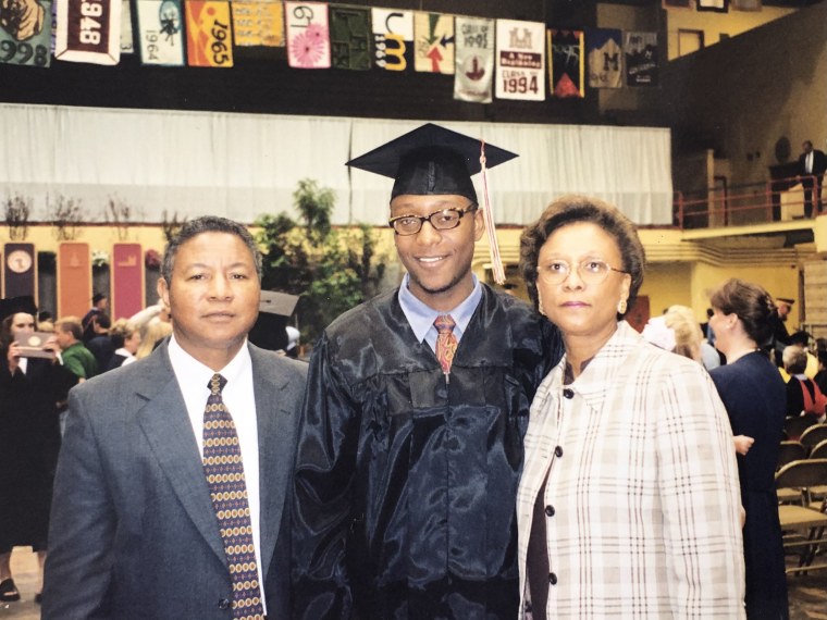 Gourdet with his parents at his University of Montana graduation.