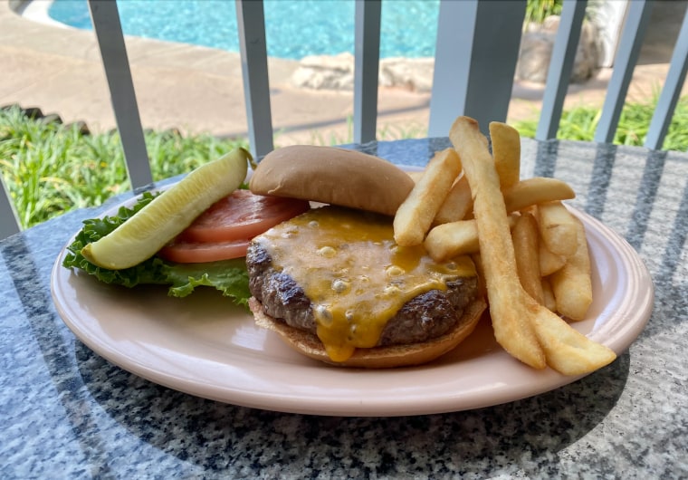 This cheeseburger at Disney's Beach Club Resort was delicious, but lost points for the extra charge for a side dish.