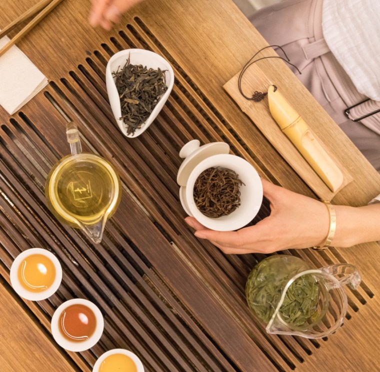 Teng's looseleaf teas handpicked and harvested from China's historic tea mountains are brewed and poured out for guests.