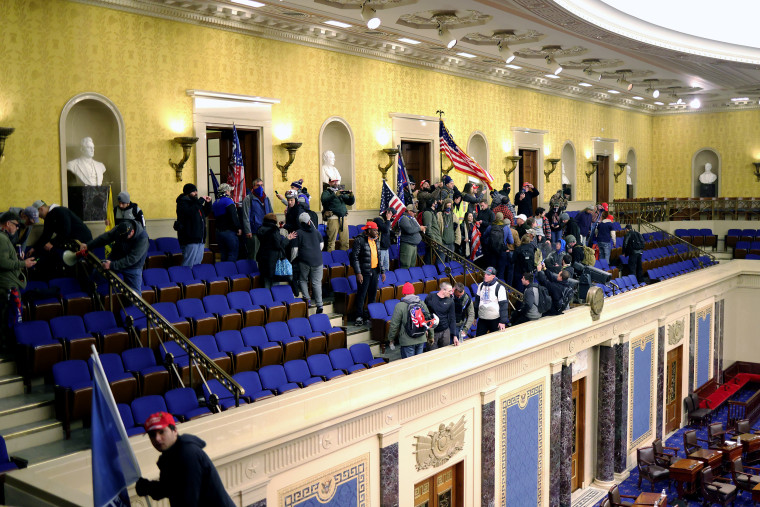 Image: Protesters enter the Senate Chamber on Jan. 6, 2021.