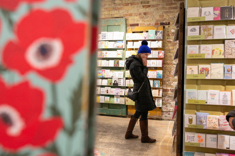 A customer shops for holiday cards at Paper Source in Chicago in 2018.