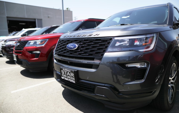 Image: Ford Explorer SUVs are parked for sale at a dealership on June 12, 2019 in Glendale, Calif.