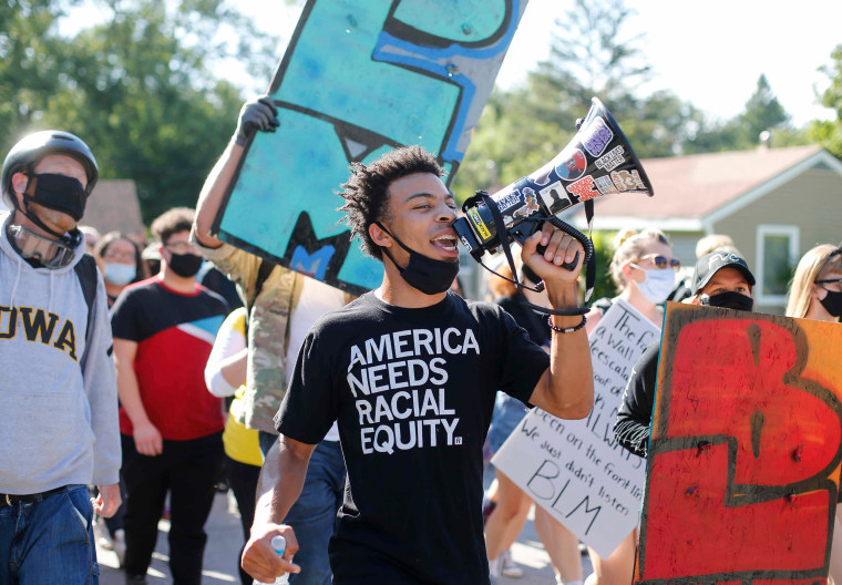 Image: Matè Muhammad leads protesters in a march in Des Moines, Iowa, on Aug. 15, 2020.