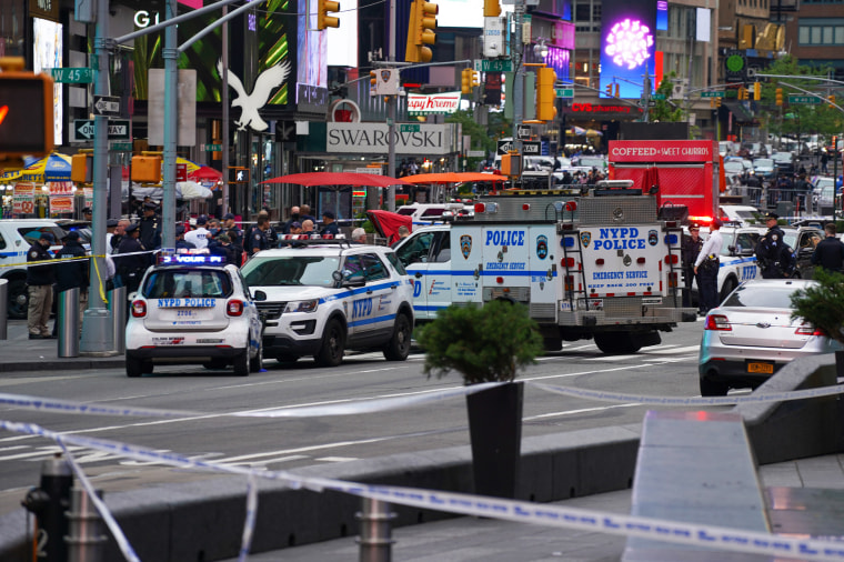Police officers respond to the scene of a shooting in Times Square on May 8, 2021, in New York.