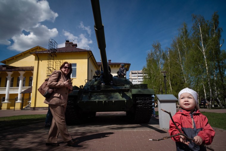 Image: Children play on a tank at the Museum of Military Equipment, Bor, Nizhny Novgorod, Russia