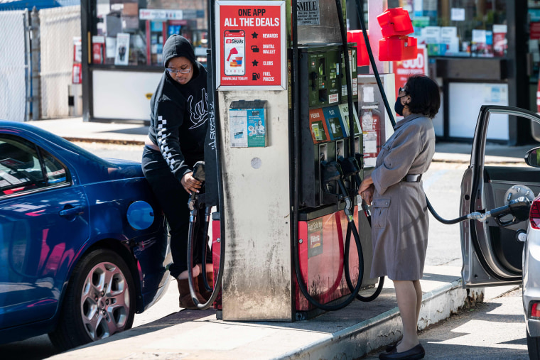 Image: Motorists fill their cars at one of the few remaining gas stations that still has fuel in Arlington, Va., on May 13, 2021.