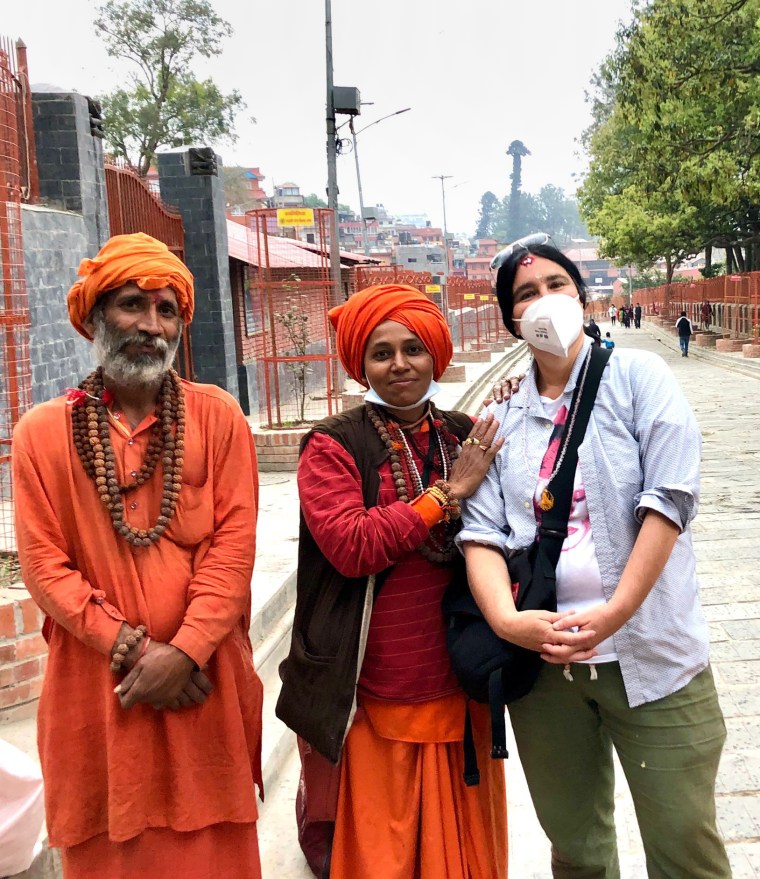 Niko Ruwe and two travelers at the Shri Pashupatinath Hindu Temple in Kathmandu during Maha Shivratri, an annual celebration of Lord Shiva that takes place in both India and Nepal.