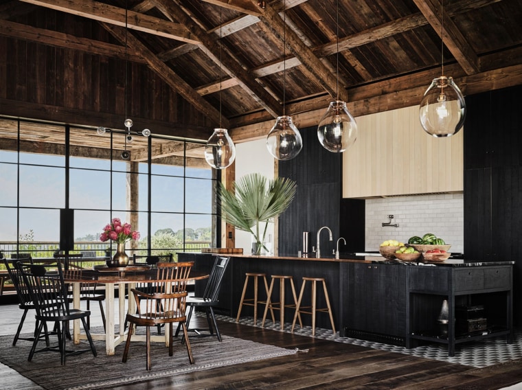 The kitchen and breakfast area feel cozy and contemporary at the same time.