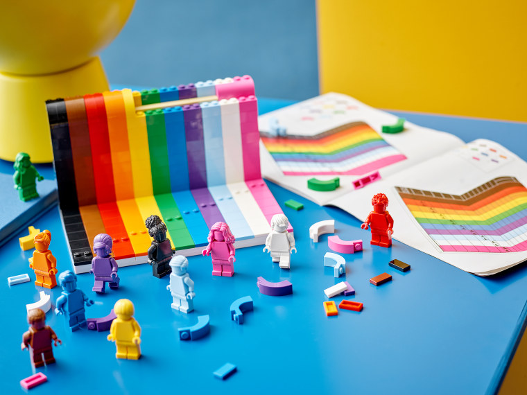 According to Lego, the buildable model is inspired by the pride flag and features 11 monochrome mini-figures, each with their own fabulous flare, unique hairstyle and rainbow color.

