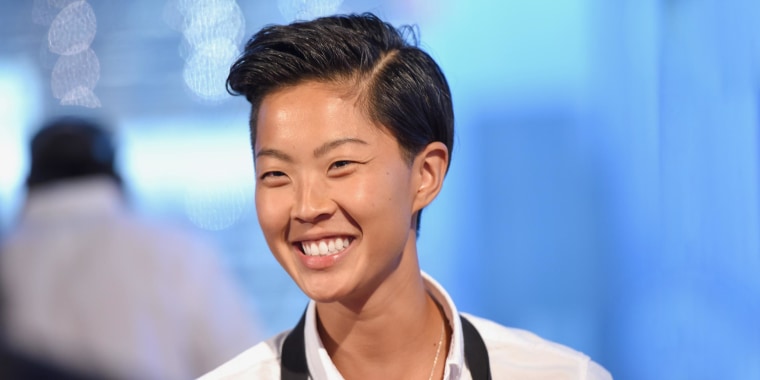 Image of Kristen Kish smiling in the kitchen