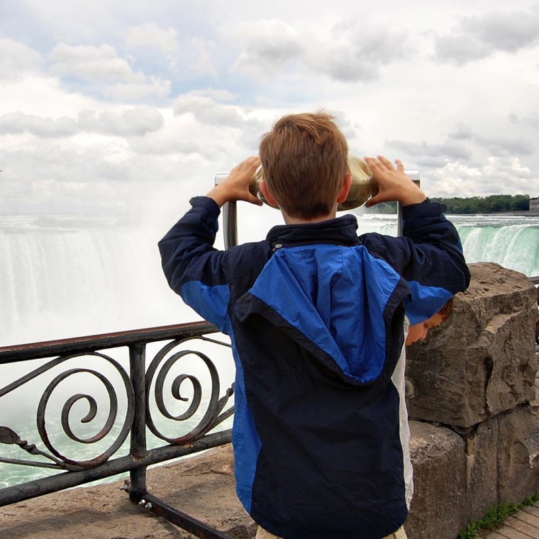 Child looking at Niagra Falls