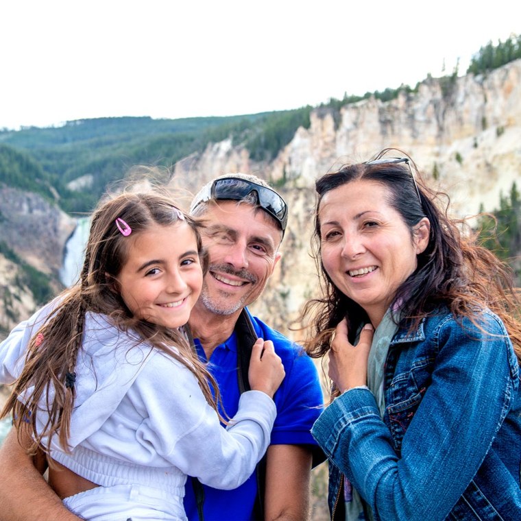 Family Smiling at Yellowstone National Park