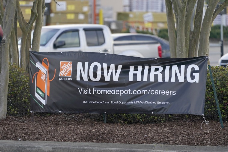 IMAGE: A hiring banner at a Home Depot store in Hattiesburg, Miss.