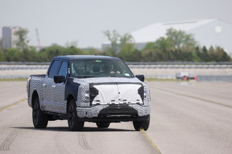 President Joe Biden tests the new Ford F-150 lightning truck as he visits VDAB Ford facility in Dearborn, Mich., on May 18, 2021.