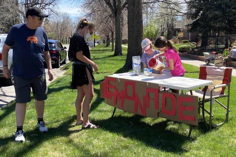 Image: Kids sell lemonade in the Park Hill neighborhood in Denver