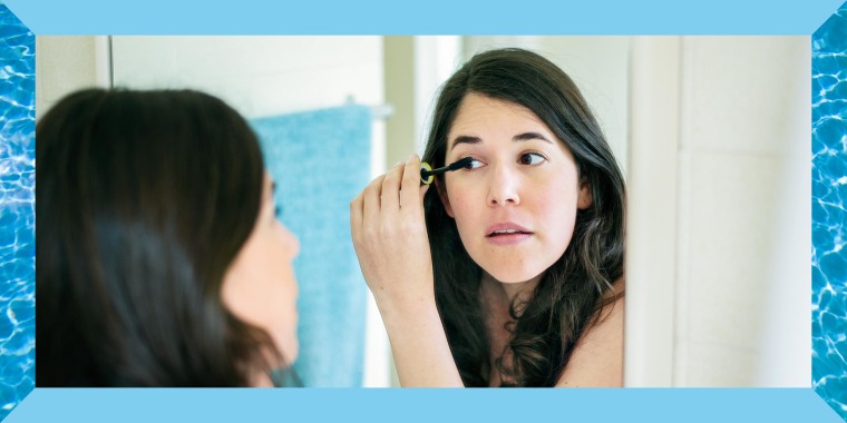 Illustration of a woman putting on mascara in a bathroom mirror