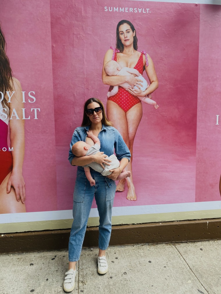 Liz Ariola poses with son, Scooter, in front of her NYC billboard.