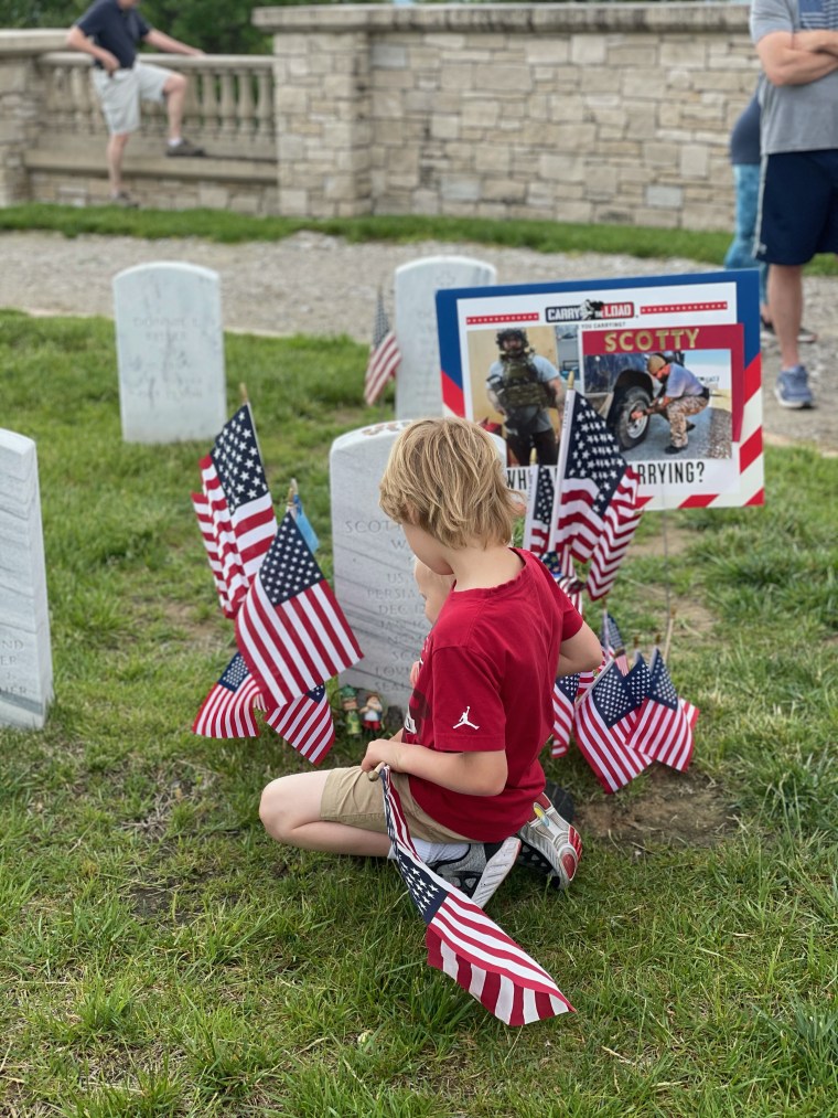 Children participate in the Carry The Load Midwest Relay at Jefferson Barracks National Cemetery in St. Louis, Missouri, on May 22, 2021.