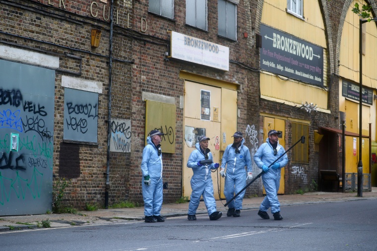 Image: Forensic officers work at the area after Sasha Johnson, a BLM activist, was shot in an early morning attack near her home in Peckham,