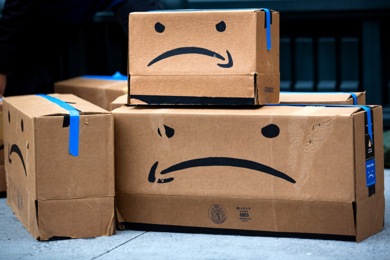 Cardboard boxes made to resemble Amazon.com Inc. packages during a protest outside the home of Amazon Chief Executive Officer Jeff Bezos in New York on Dec. 2, 2020.