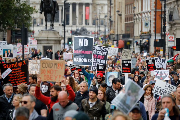 Image: Protesters march down Whitehall in central London at a demonstration organized by Save our Rights