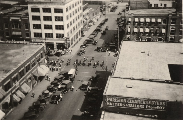 Detainees being marched through downtown Tulsa, Okla., on June 1, 1921, viewed from the roof of the Daniel Building.