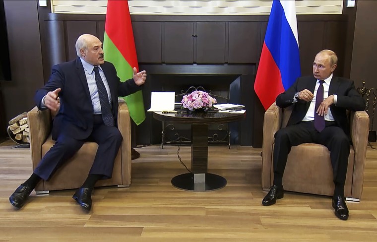 Russian President Vladimir Putin and Belarusian President Alexander Lukashenko talk during another meeting in Sochi, Russia in September 2020.