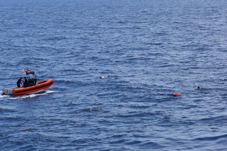 The U.S. Coast Guard rescued 8 people and recovered 2 bodies from the water on May 27, 2021, 18 miles southwest of Key West, Fla.