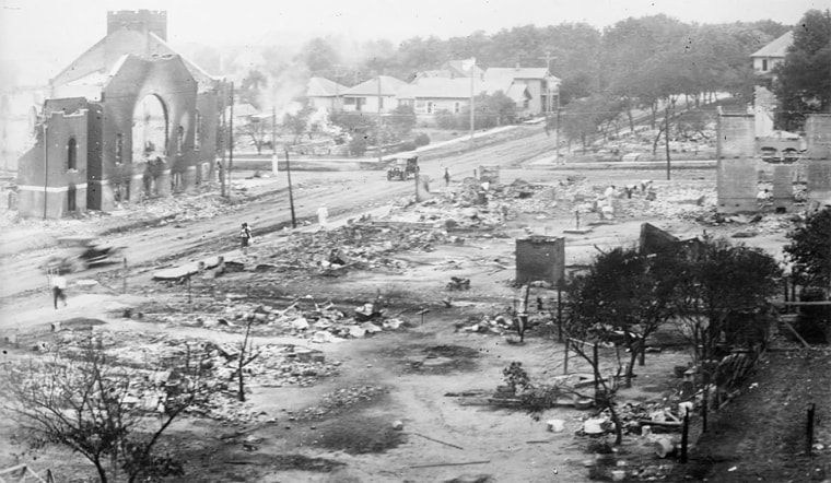 Image: The aftermath of the burning of buildings during the Tulsa Race Massacre in Oklahoma in June 1921.