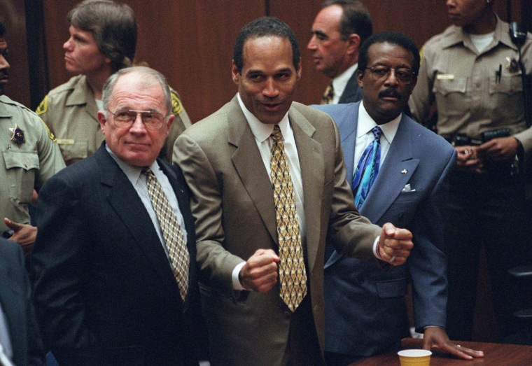 IMAGE: O.J. Simpson reacts as he is acquitted murdering Nicole Brown Simpson and Ron Goldman in 1995.