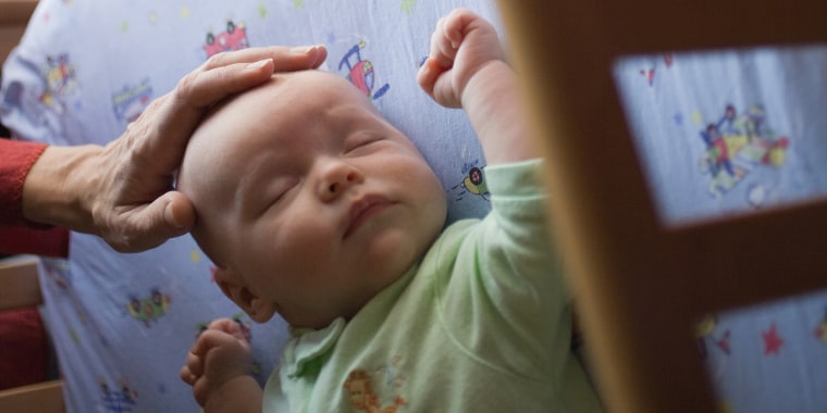 Baby sleeps on outlet my chest at night