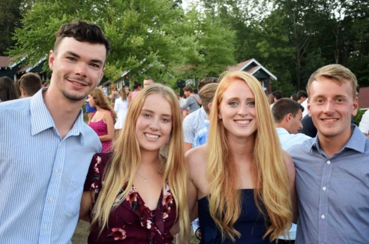 Image: Joe Mee, a Camp Walden employee and resident of Leicester, England, with three other international staff members.