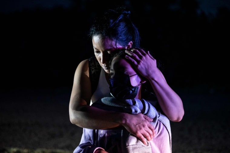 Tabata Rodriguez embraces her daughter Sofia after being apprehended near the border between Mexico and the United States in Del Rio, Texas, on May 16, 2021.