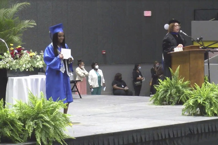 This frame grab from video provided by Jackson Public School District shows Kennedy Hobbs, left.