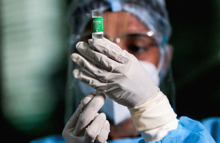 Image: A health official draws a dose of AstraZeneca's Covid-19 vaccine in Colombo, Sri Lanka, on Jan. 29, 2021.