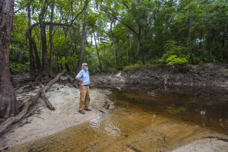 John Quarterman stands by the Withlacoochee River.