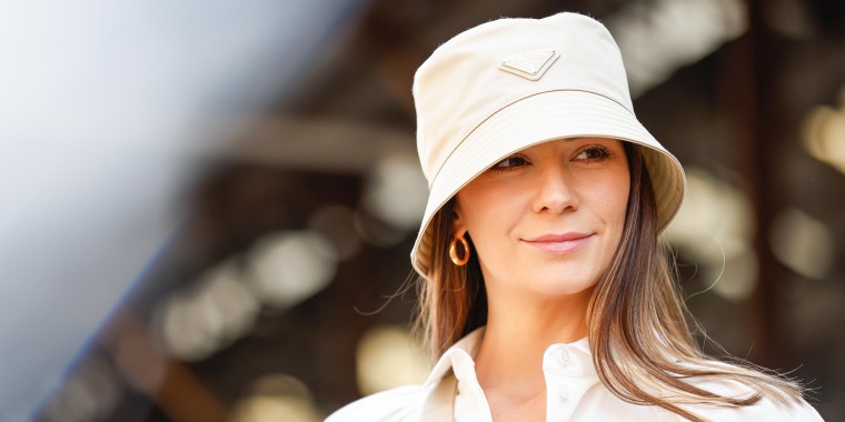 Woman wearing Prada bucket hat