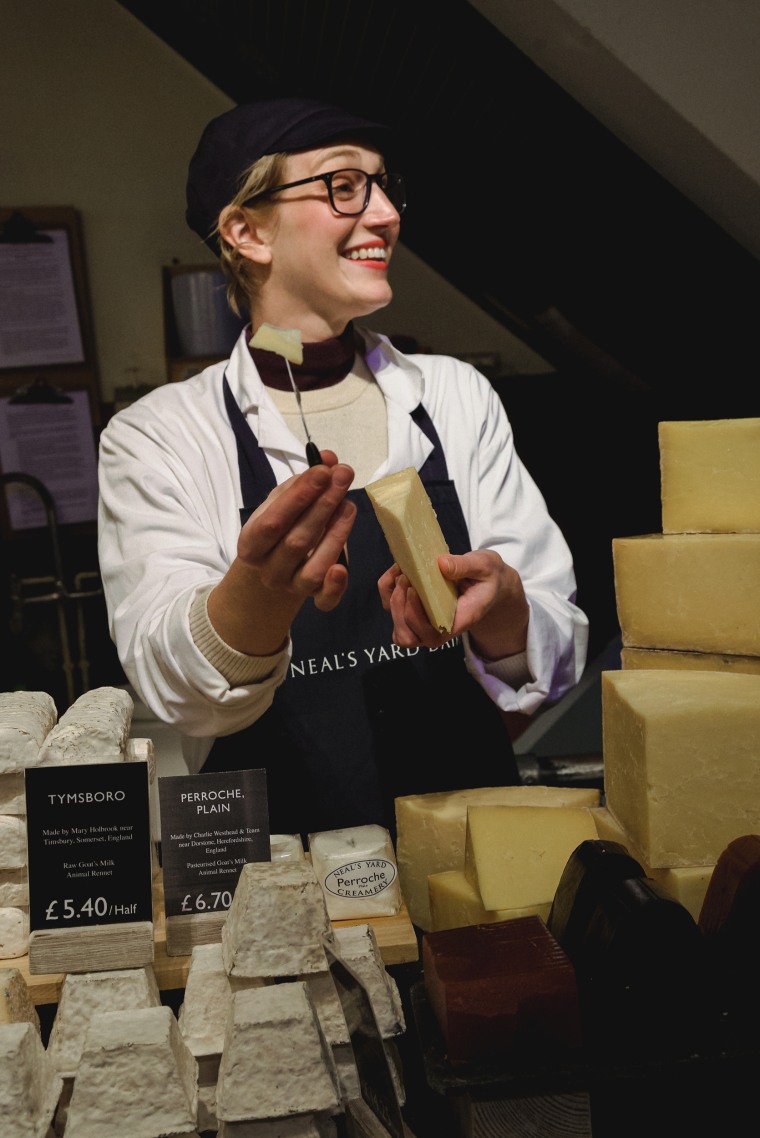 Me working as a cheesemonger at London’s famed cheese shop Neal’s Yard Dairy.