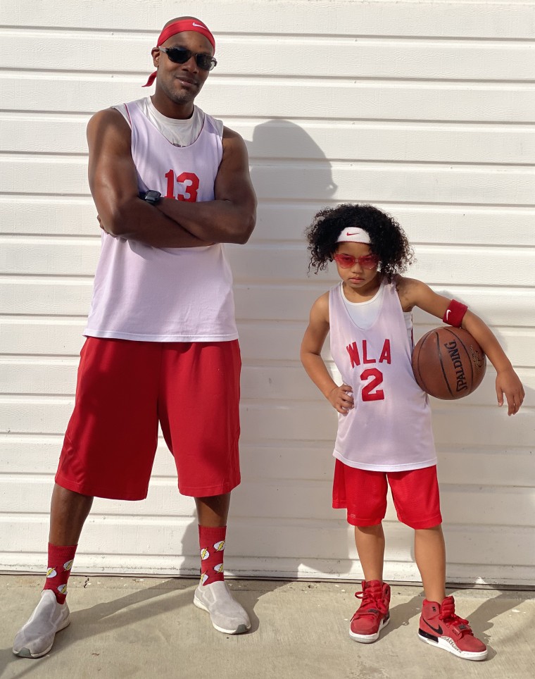 Doyin Richards coaches his daughter's basketball team.