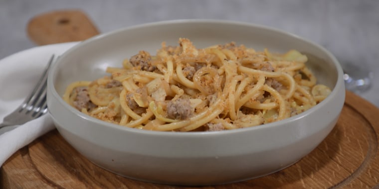 Toss bucatini and sausage in this velvety sauce served with crunchy, garlicky topping.