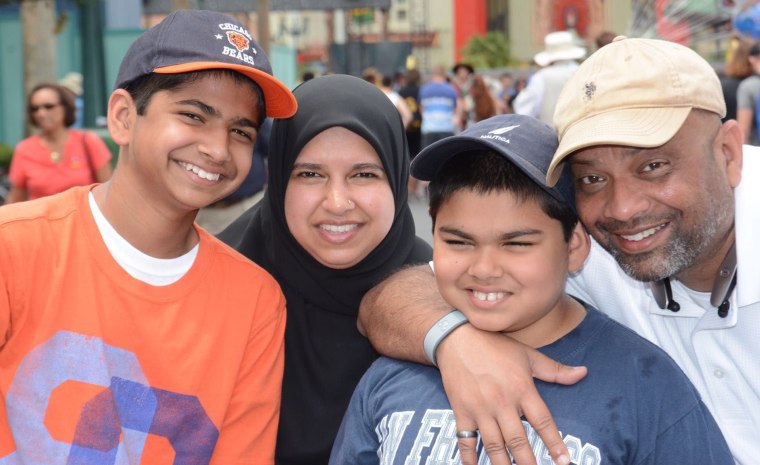 Dr. Shaiba Ansari-Ali, center, shares a happy moment with her family days before the stroke.