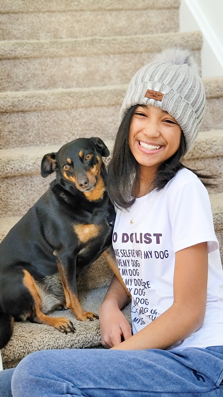 Ava Dorsey and her dog, Lacy