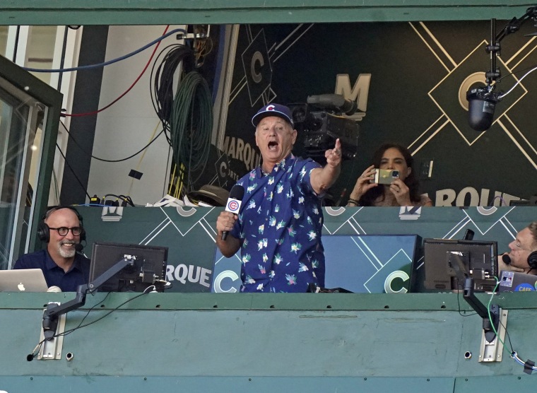 Actor Bill Murray sings \"Take Me Out to the Ball Game\" during the seventh inning of a game between the Chicago Cubs and the St. Louis Cardinals at Wrigley Field June 11, 2021 in Chicago, Illinois.