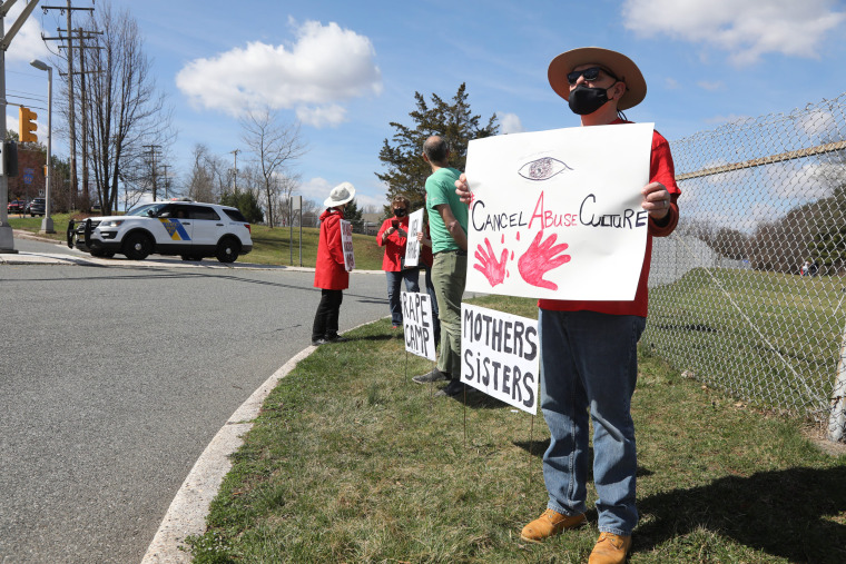 Protesters at the entrance to the Edna Mahan Correction Facility in Clinton, N.J., on March 27, 2021.